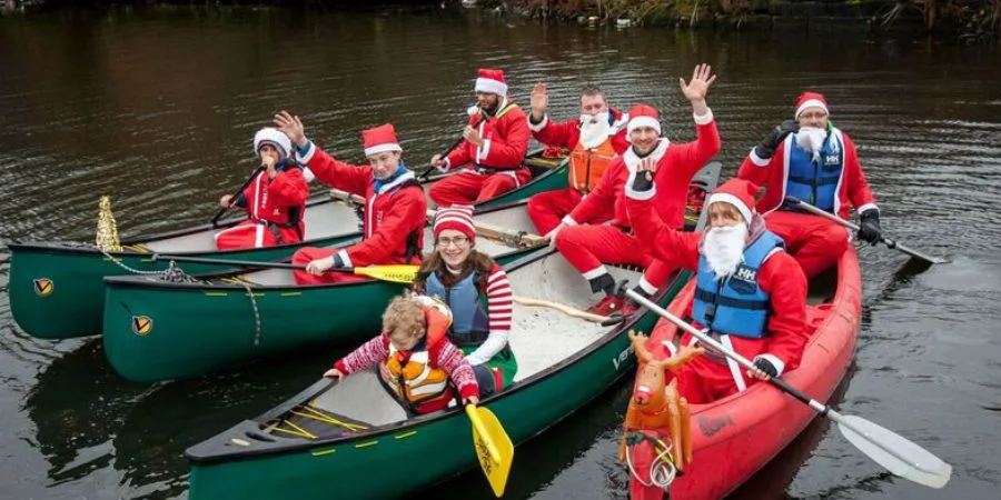 Santa Paddle For Alder Hey Children's Charity at Royal Albert Dock