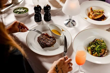 Five Course Gourmet Dining with Cocktail at Marco Pierre White's London Steakhouse Co and Thames River Cruise for Two at Marco Pierre White's London Steakhouse Co and Thames River Cruise for Two, Westminster Pier