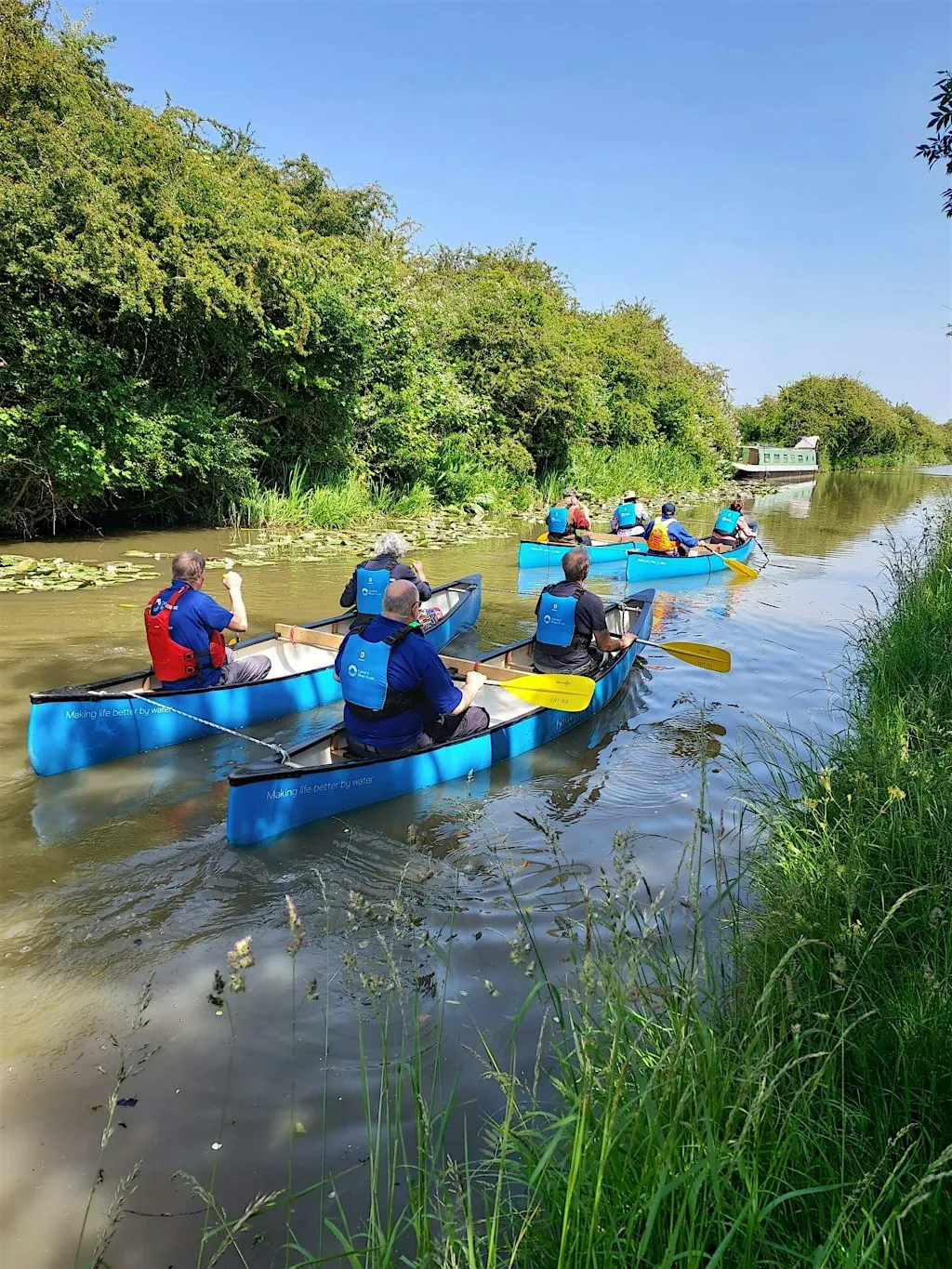 Family Canoeing Kilby Bridge at Canal and River Trust Workyard
