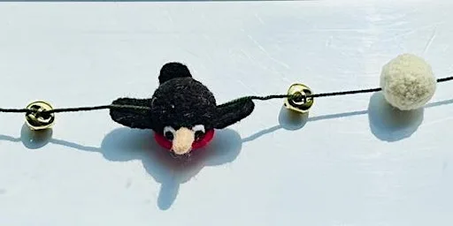 Needlefelt Christmas Garland with festive drink