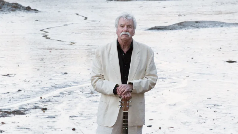 TOM RUSH